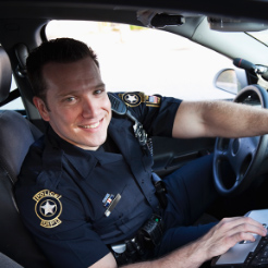 Patrolman inside car